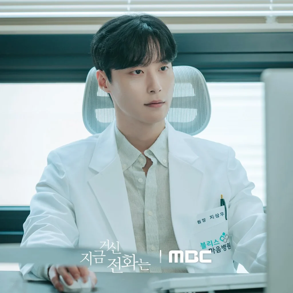 Heo Nam-joon as Ji Sang-woo, looking at someone