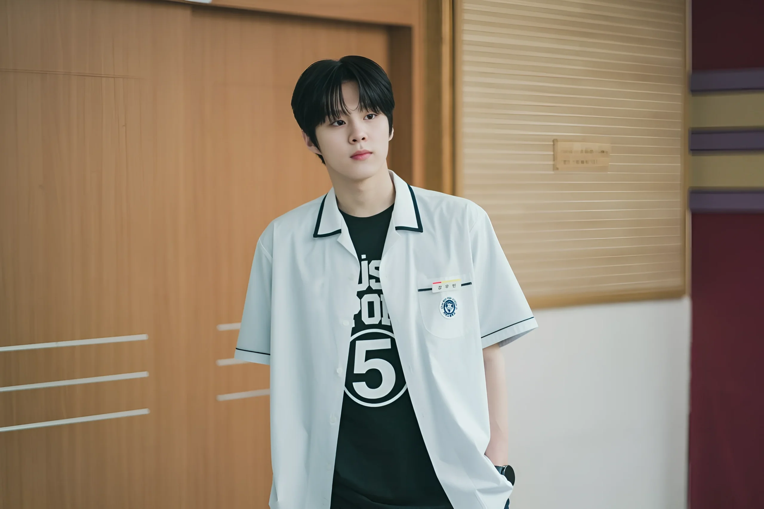 Kim Woo-seok simply giving a pose while wearing the school uniform in "Social Savvy Class 101"