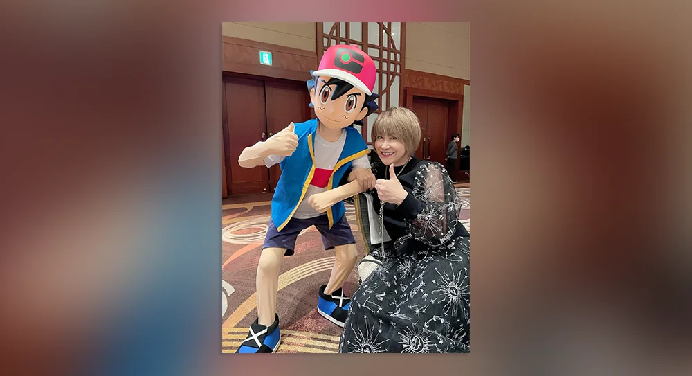 Rica Matsumoto alongside Ash Ketchum's model.