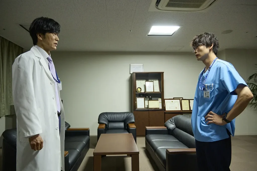 Dr. Takasaki asking Makino to consider patients and their families' perspective too.